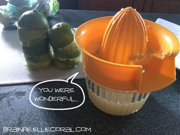 Eleven lime halves sit across from the juicer apparatus. More lime juice has been collected in the cup. A speech bubble has the juicer say, 'You were wonderful...'