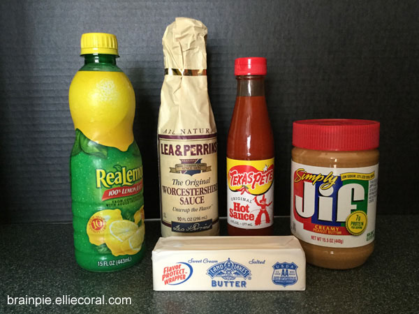 A bottle of lime juice, Worcestershire sauce, Texas Pete hot sauce, Simply Jif creamy peanut butter, and a stick of butter.