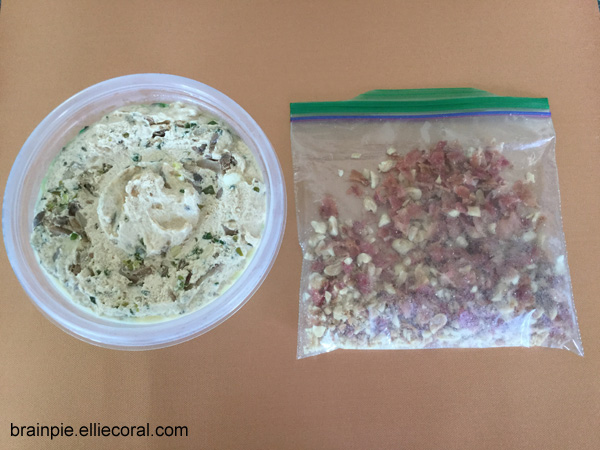 On the left is the container with festive mixture. On the right is a plastic bag of peanut and bacon crumbles.