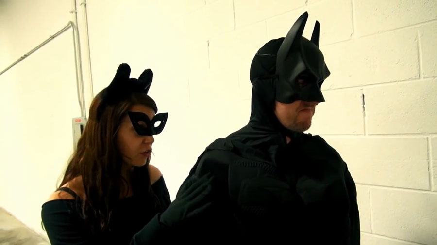 Rebecca-Catwoman and Donnie-Batman rush onto the scene.