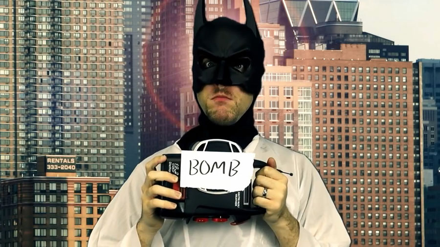 Bat-Jesus holds the bomb.